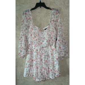 Trixxi Floral  Romper(Pit to pit 19” Length 30”)